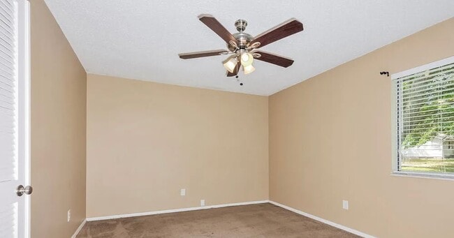 Building Photo - 6911 Candlewick Way