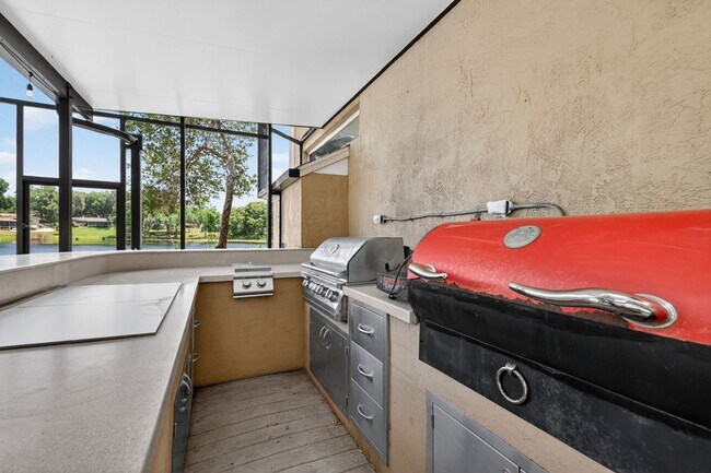 Building Photo - Available Now! Waterfront Living at Its Best – Pool, Decks & Gated Privacy