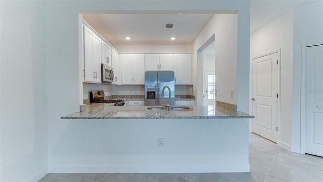 Building Photo - 15235 Sunny Day Dr