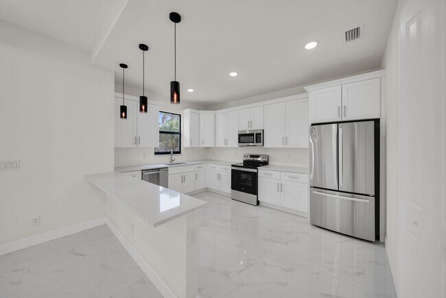 Building Photo - Be the first in occupy this 2026 constructed home in the city of Port Charlotte FL! Qualify for a...