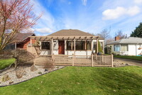 Building Photo - CUTE AND COZY TWO BEDROOM WITH GARAGE