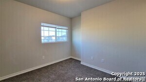 Building Photo - 8331 Breezy Cv