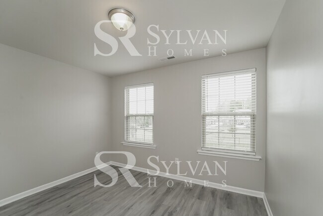 Building Photo - Come view this charming home