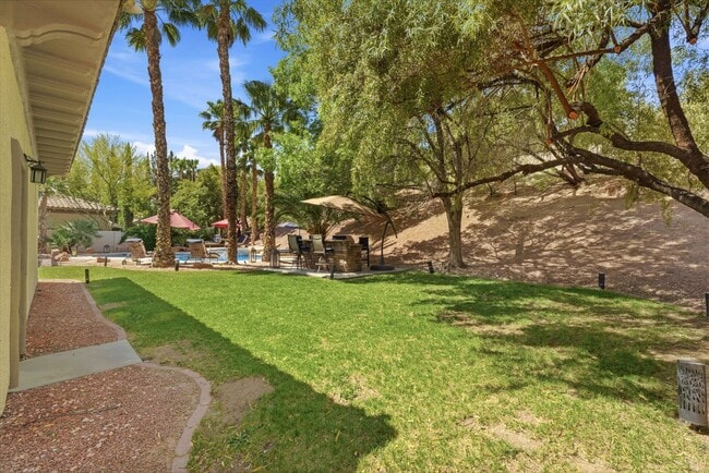 Building Photo - Private Gated Christopher Homes Estate in The Vineyards | Resort-Style Backyard & Strip Views