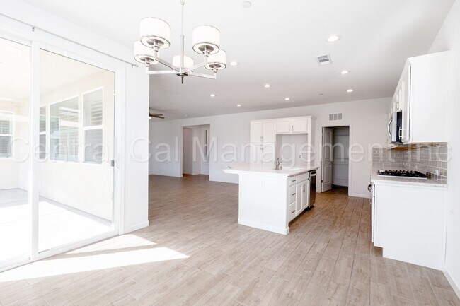 Building Photo - 4 Bedroom/2 Bath Home with Paid Solar - $2995 Per Month!