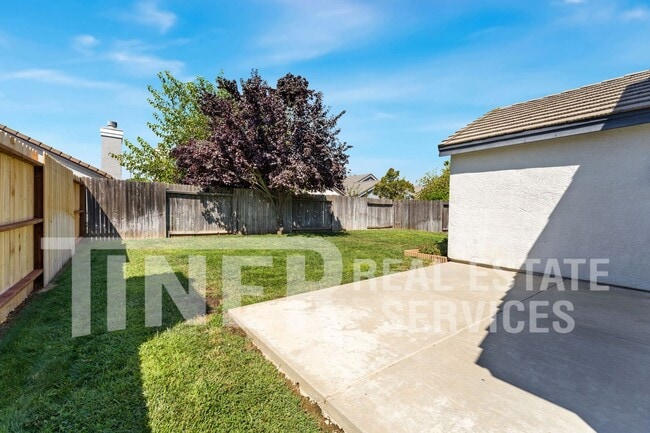Building Photo - 8560 Harvest House Way