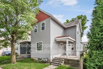 Building Photo - 65 E 7th Ave