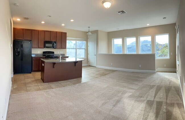 Living area, kitchen and dining nook - 7981 Lower Perse Cir