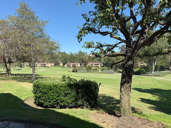 Building Photo - Enjoy stunning panoramic views of the golf...