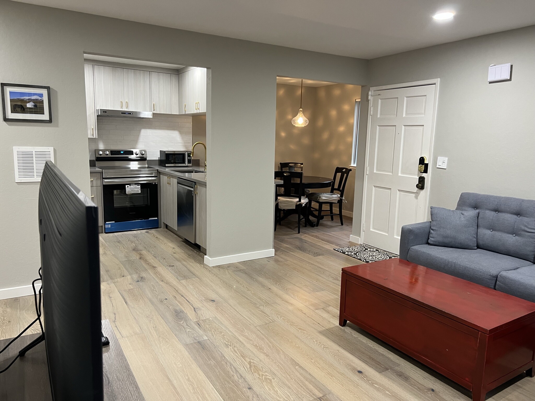 Living Room: Kitchen, Dining Room, Entrance - 1177 Honey Trl