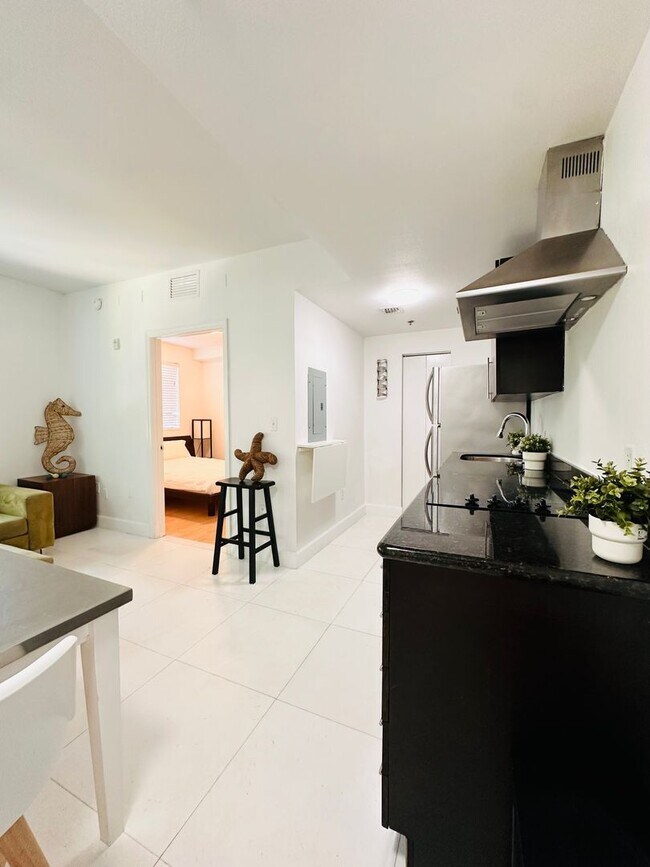 Building Photo - Bright and furnished 1/1 in classy remodel...