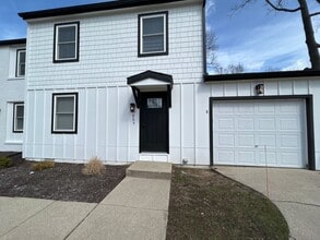Building Photo - Beautifully Redone 3-Bedroom, 1.5-Bathroom Condo with Attached Garage – $1,725/Month (Lawn Care &...