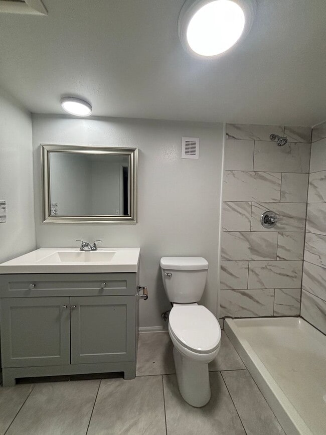 Building Photo - Large 2-story townhome with finished basement & 1-car garage!