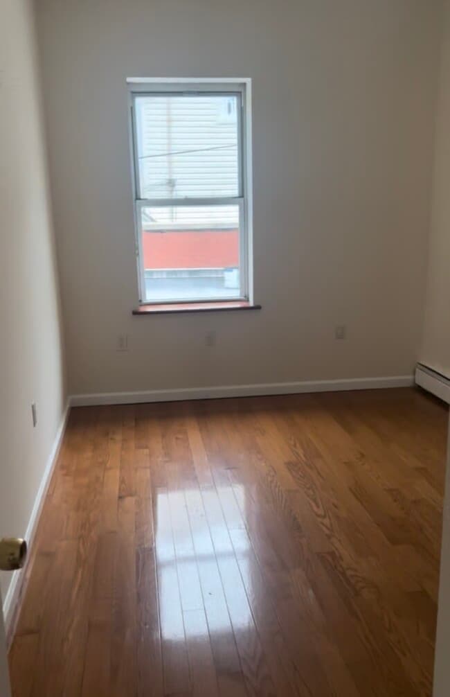 Building Photo - 12307 Jamaica Ave