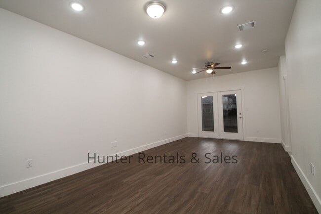Building Photo - Upscale Four-Bedroom Townhome!