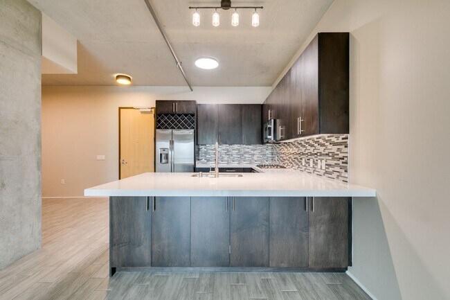 Building Photo - Modern High-Rise Living at Juhl with City Views