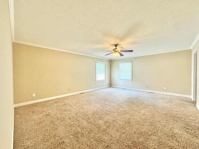 Building Photo - Spacious 3 Bedroom with Backyard Pool