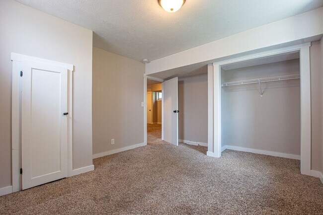 Building Photo - Adorable Brick 4 Bedroom Ranch with Finish...