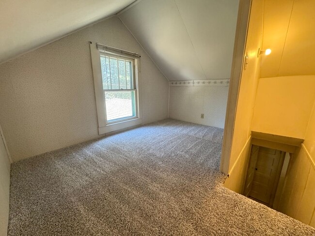 Building Photo - Spacious & Updated Home with Bonus Room, Large Basement, & Garage