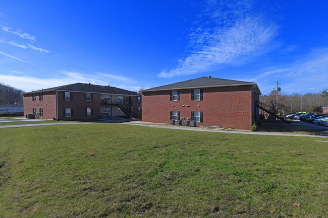 Exterior shot of the buildings - The Elena Apartment Homes