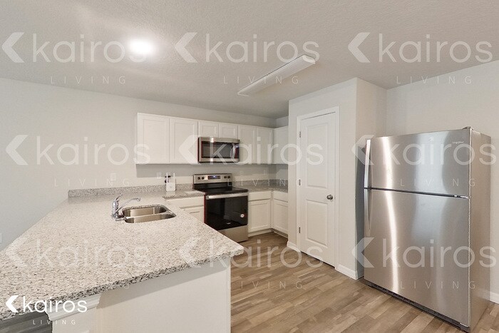 Building Photo - 8755 N Nobleton Way