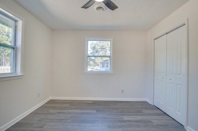 Building Photo - Stunning 4BR/2BA Pensacola Home with Private Pool, Modern Kitchen, Luxury Vinyl Flooring, Fully F...