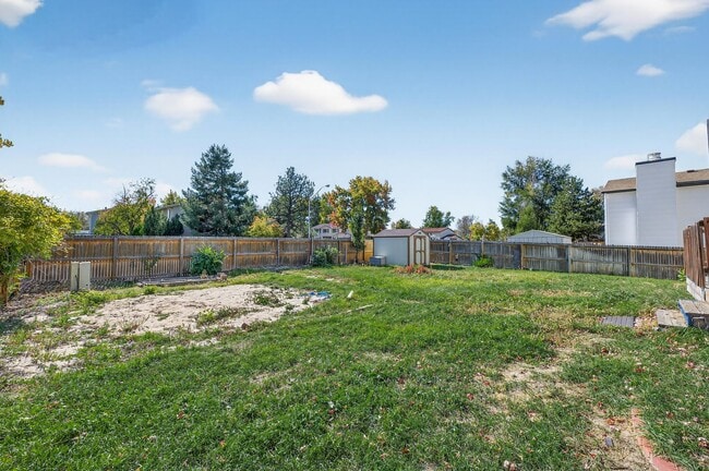 Building Photo - For Rent: Charming 4-Bedroom Tri-Level in ...