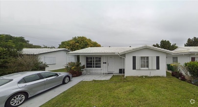 Building Photo - 8409 NW 59th Ct