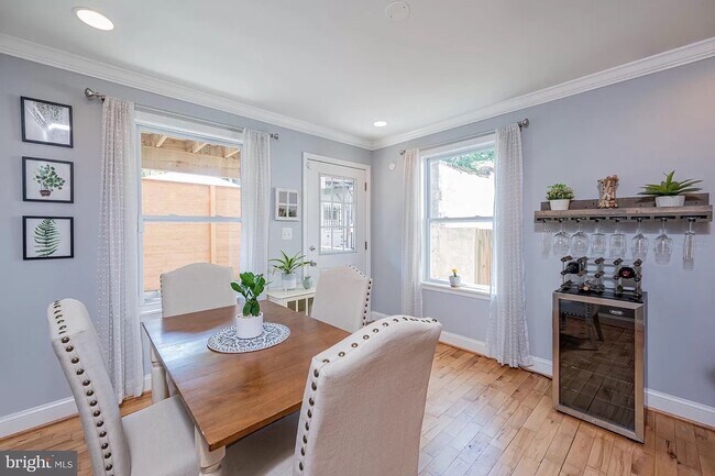 Dining room flooded with light - 217 S Regester St