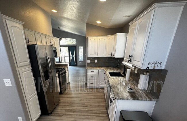 Building Photo - 10647 W Bellwood Pl