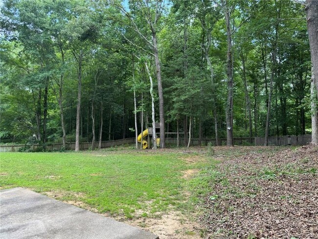 Building Photo - 7454 Woody Springs Dr
