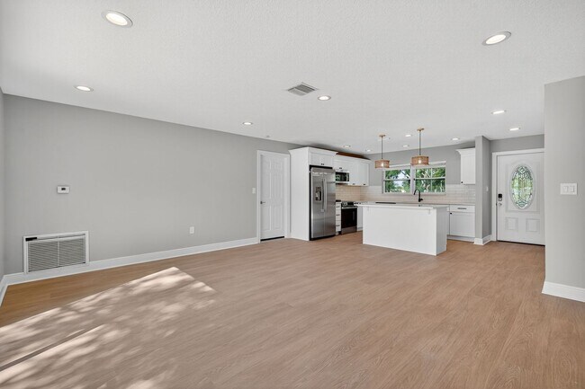 Building Photo - Fully Remodeled 3BR Home with Large Fenced Yard & New Deck