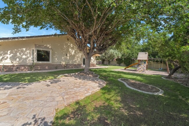 Building Photo - A stunning custom estate nestled in the pr...