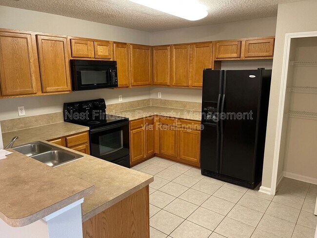 Building Photo - 9575 Amarante Cir