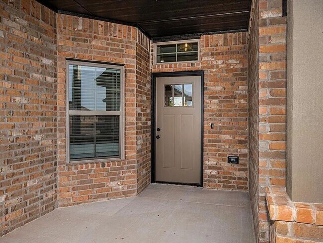 Building Photo - Modern 4-Bed, 2-Bath Mustang Home with 3-Car Garage!