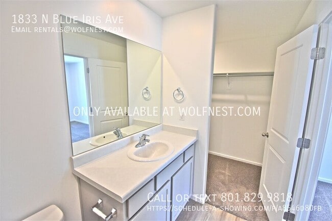 Building Photo - 1833 N Blue Iris Ave