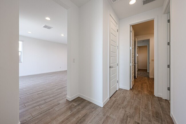 Building Photo - COMING SOON!! Recently built 5-Bedroom Home in Goodyear with Upgrades & Resort-Style Amenities