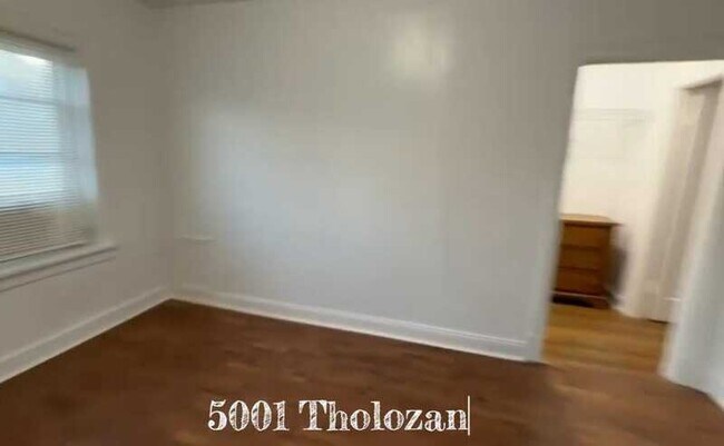 Building Photo - 5001 Tholozan Ave