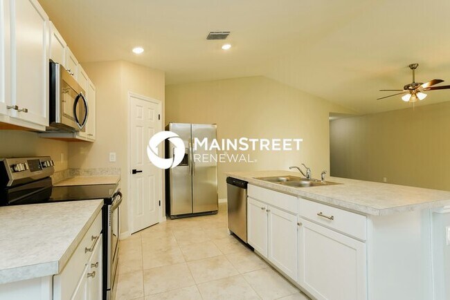 Building Photo - 4 Bedroom Pet-Friendly Home in Cape Coral, FL with Main Street Renewal