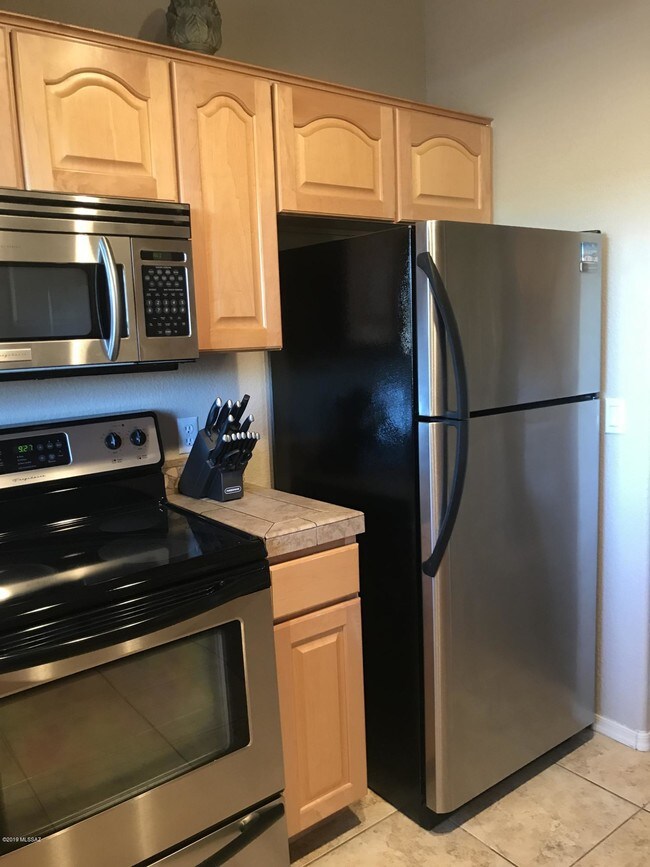 Building Photo - 7050 E Sunrise Dr