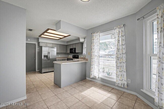 Building Photo - 8472 Bandera Cir W