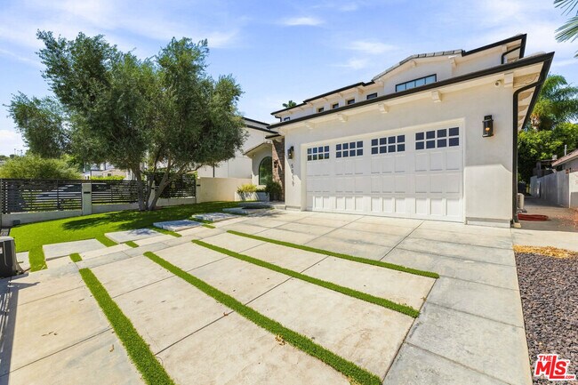 Building Photo - 5017 Hesperia Ave