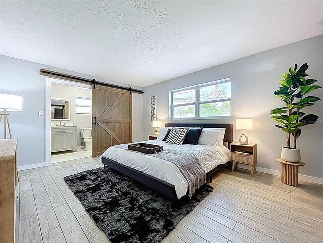 Building Photo - Modern luxury meets Florida charm in this ...
