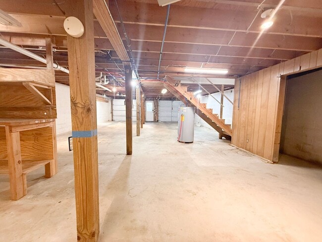 Building Photo - Spacious 3-Bedroom Home with Screened Porch, 2-Car Garage + Workshop