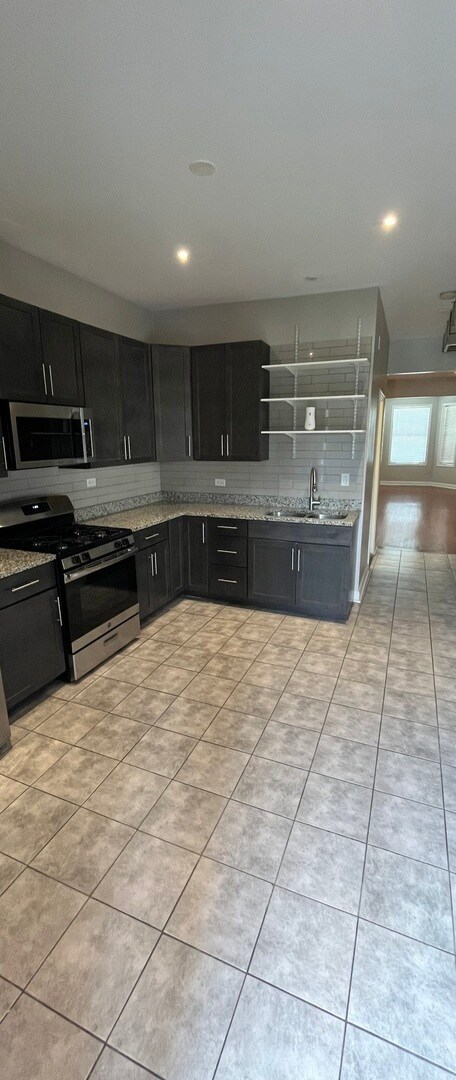 Building Photo - 1533 S Spaulding Ave
