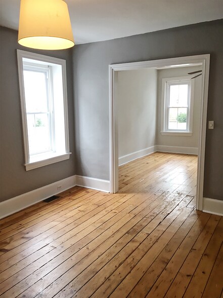 Original wide pine floors throughout. - 817 W Bridge St