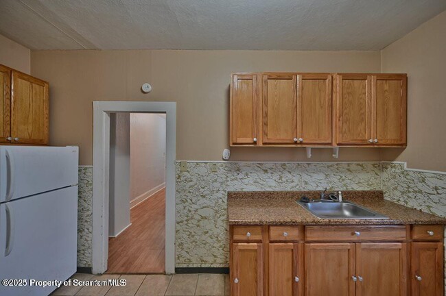 Building Photo - 1416 Capouse Ave