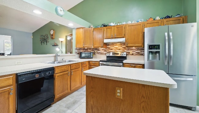 Building Photo - private - backyard fenced in large master suite!