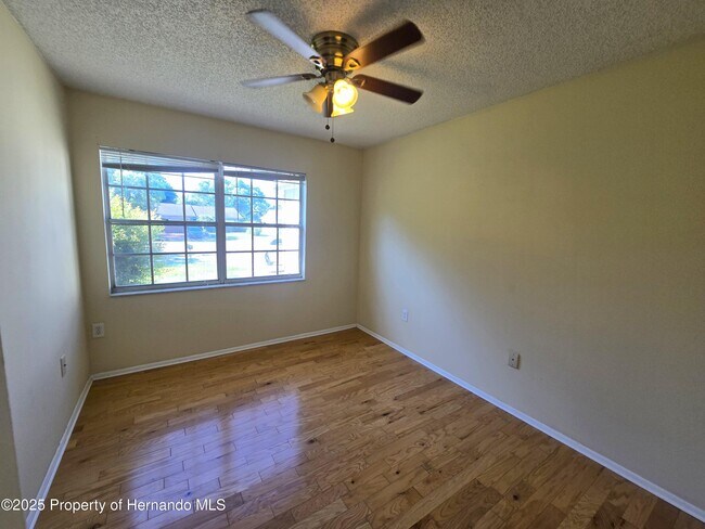 Building Photo - 8915 Woodmill Dr