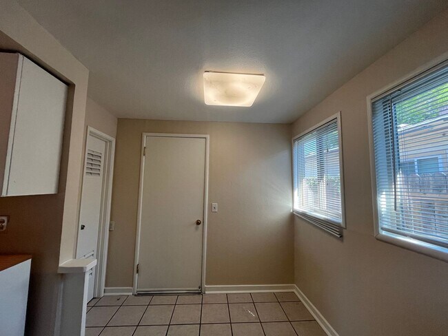 Building Photo - 2 bed 1 bath single family home with back yard and garage space